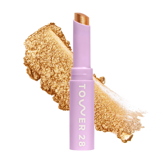 Eyeshadow with glittery texture and 'Tower 28' branding on a white background [Bungalow]