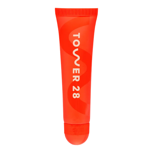 The Tower 28 Beauty LipSoftie™ Lip Treatment in the shade SOS Vanilla. [SOS Vanilla]