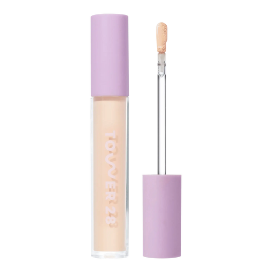 Tower 28 Beauty Swipe Serum Concealer in the shade 3.0 CC, shown with the tube standing upright next to the open applicator wand to reveal the product. [3.0 CC]